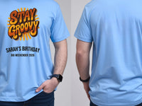 Personalised We Love the 70s Big Weekender Tee — carolina blue tee, front and back view