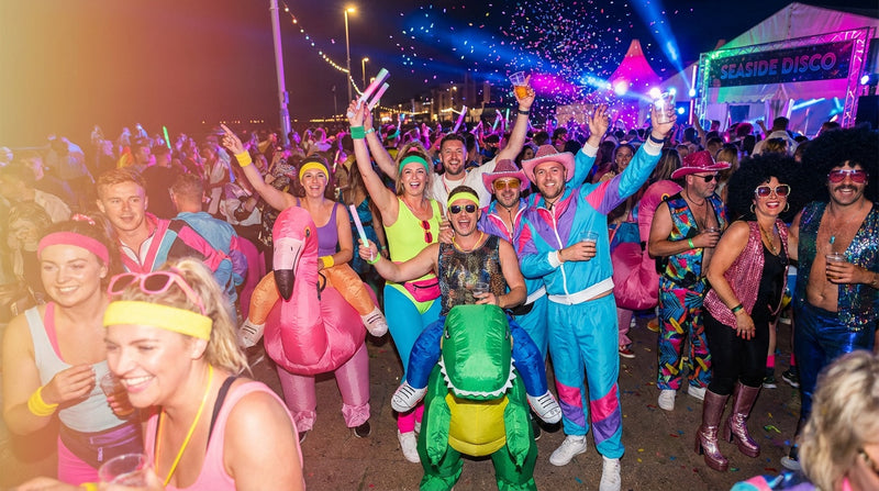 Group of friends in matching custom t-shirts at a Butlins Big Weekender